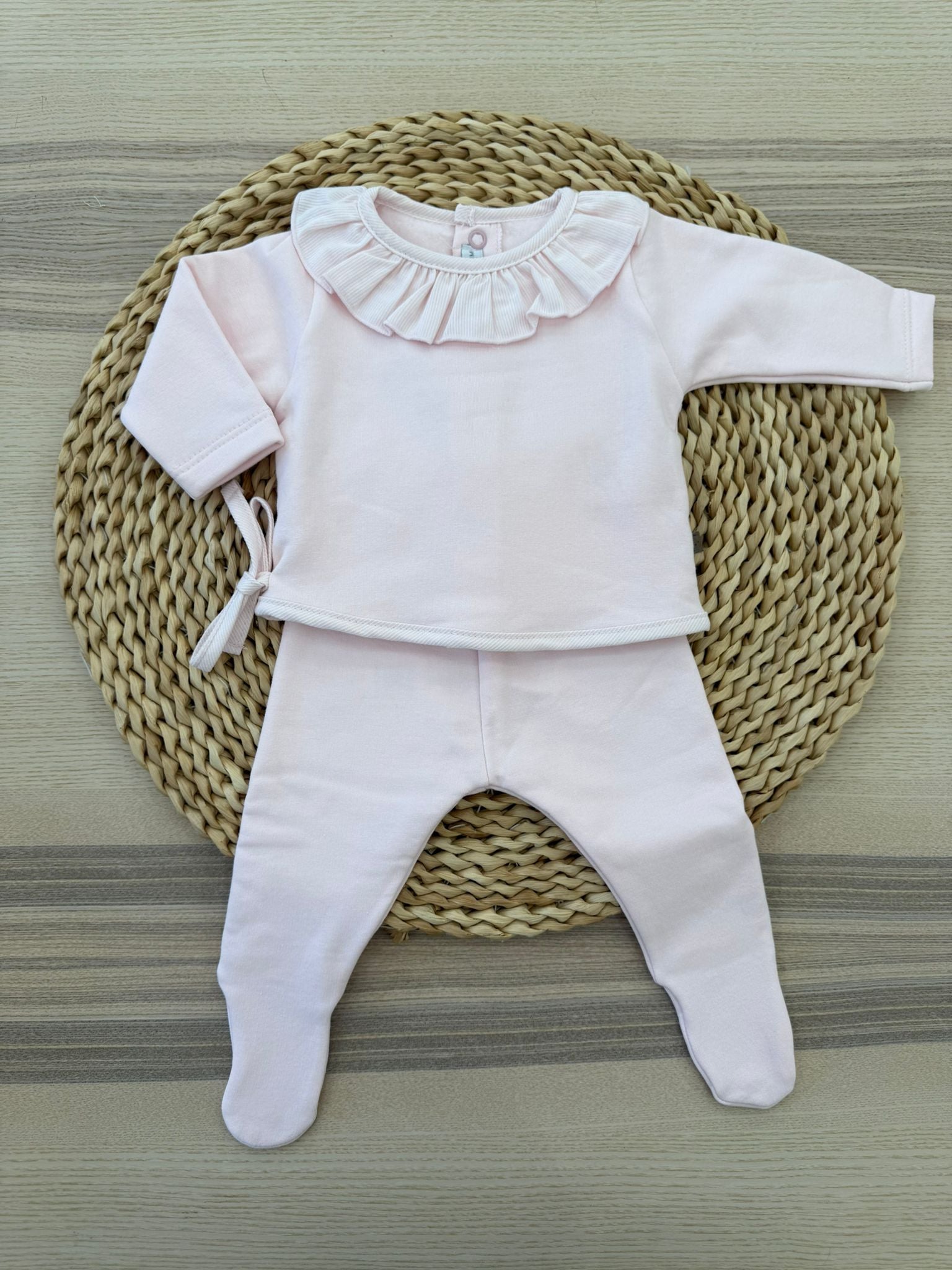 Tutina due pezzi con collo