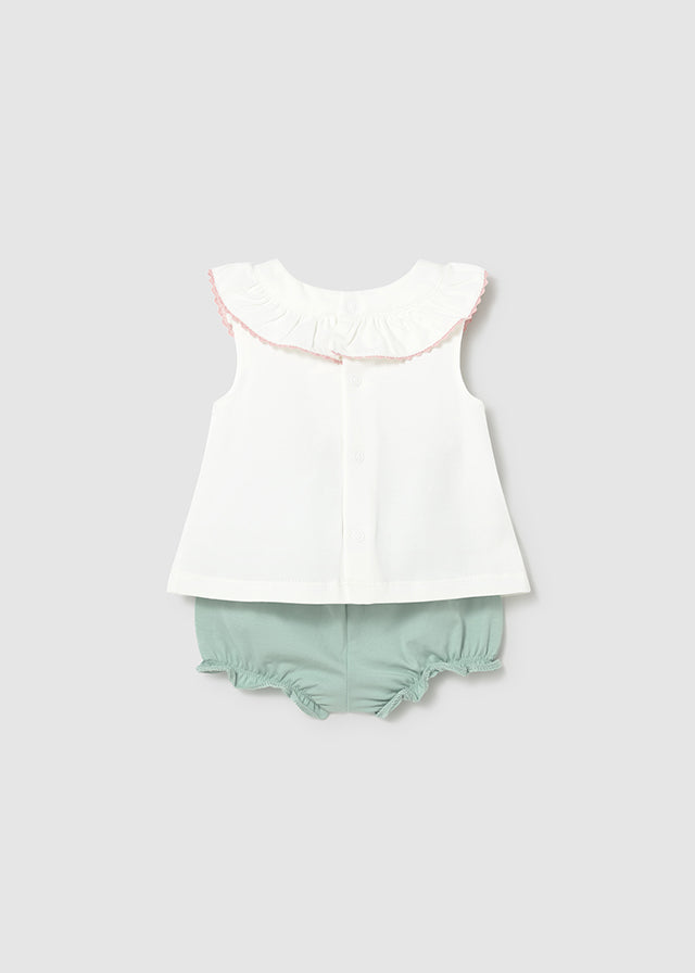 Compl. pant corto con fiori ricamati