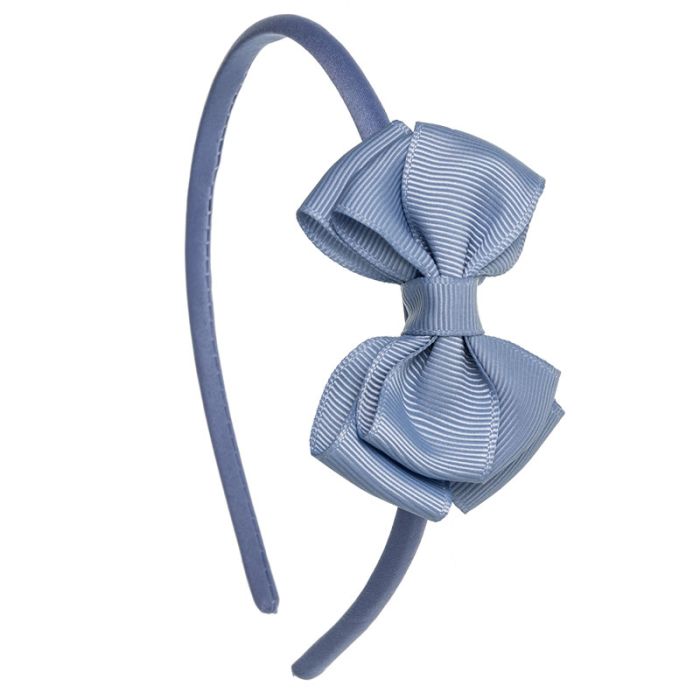 Cerchietto per bambina con fiocco in gros grain a
forma di farfalla