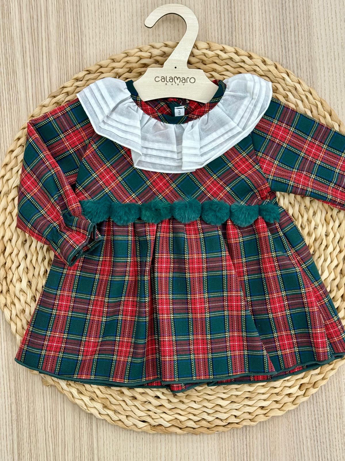 Abito con pon pon di pelliccia