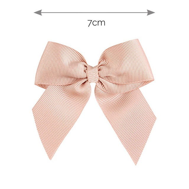 Fermaglio capelli con fiocco grosgrain.