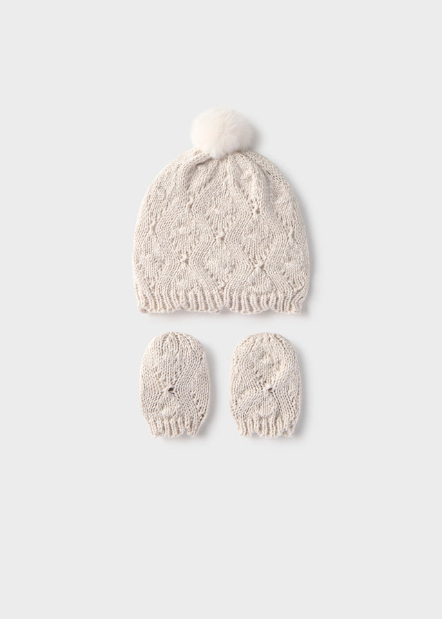 Comp. cappello manopole