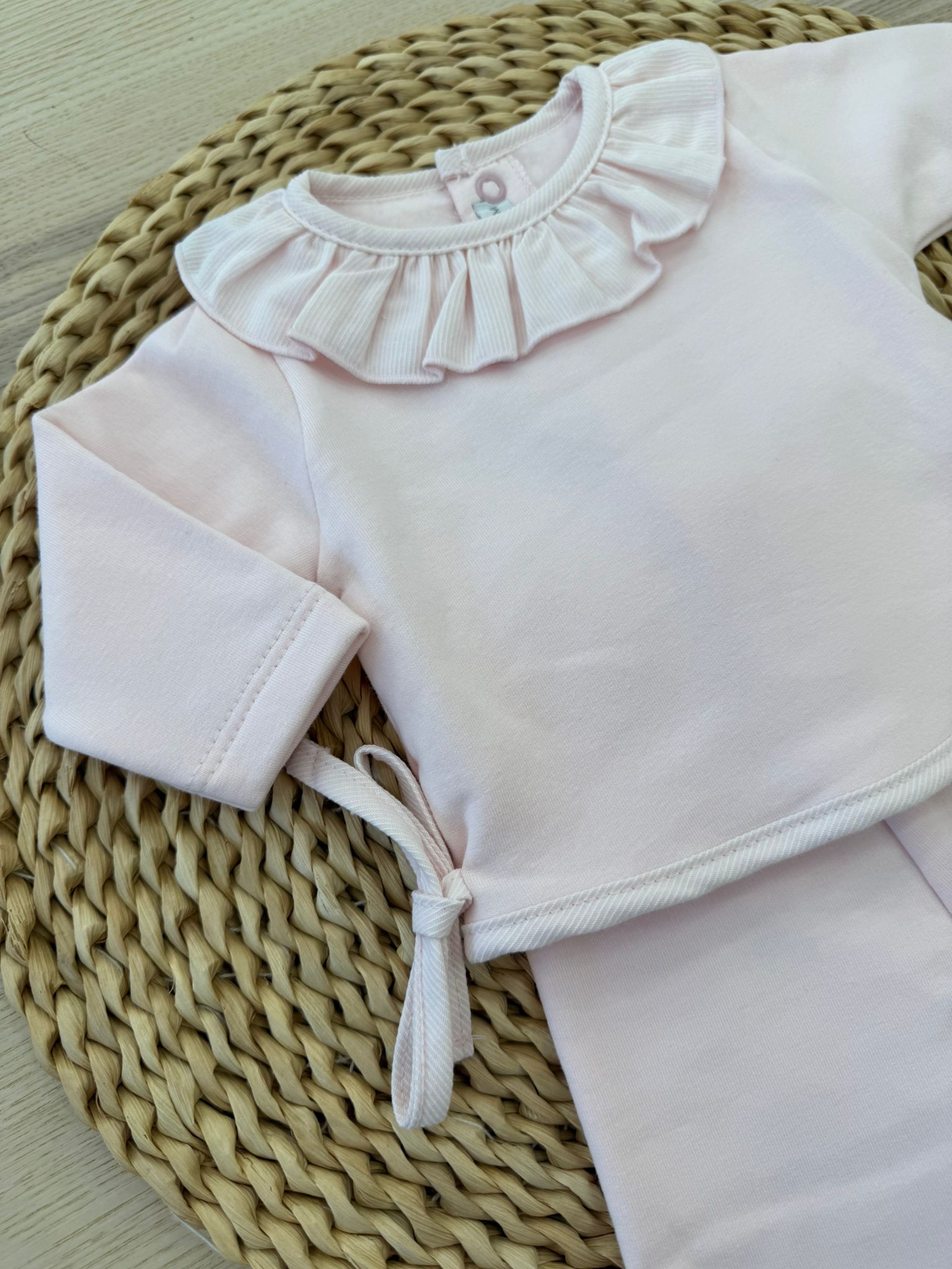Tutina due pezzi con collo
