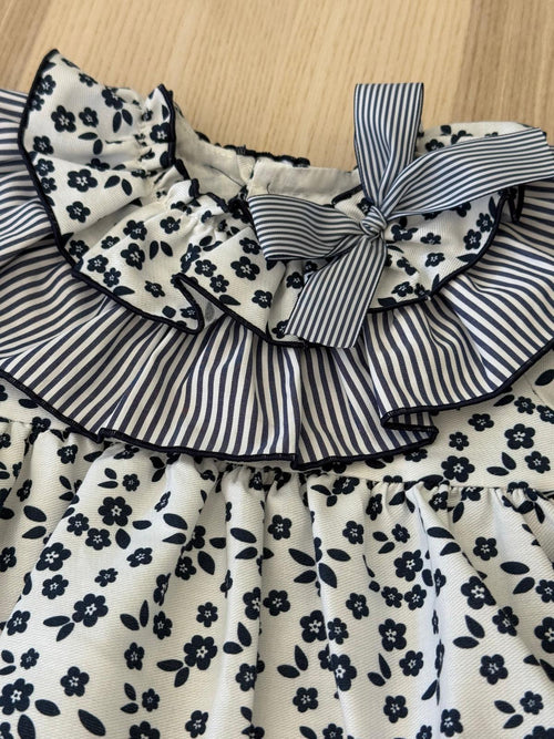 Abito  con fiori blu e fiocco sul collo