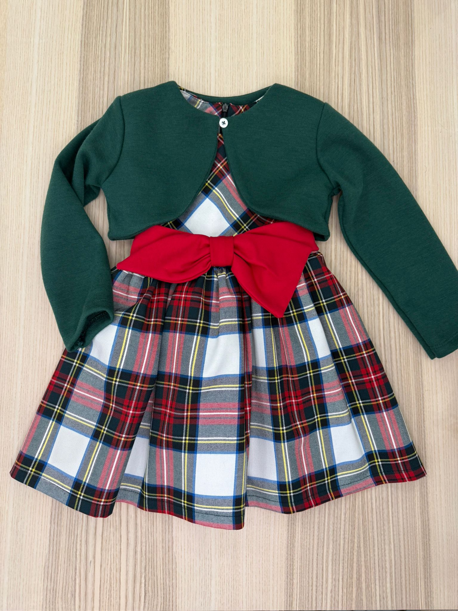 Abito in tartan con fiocco rosso