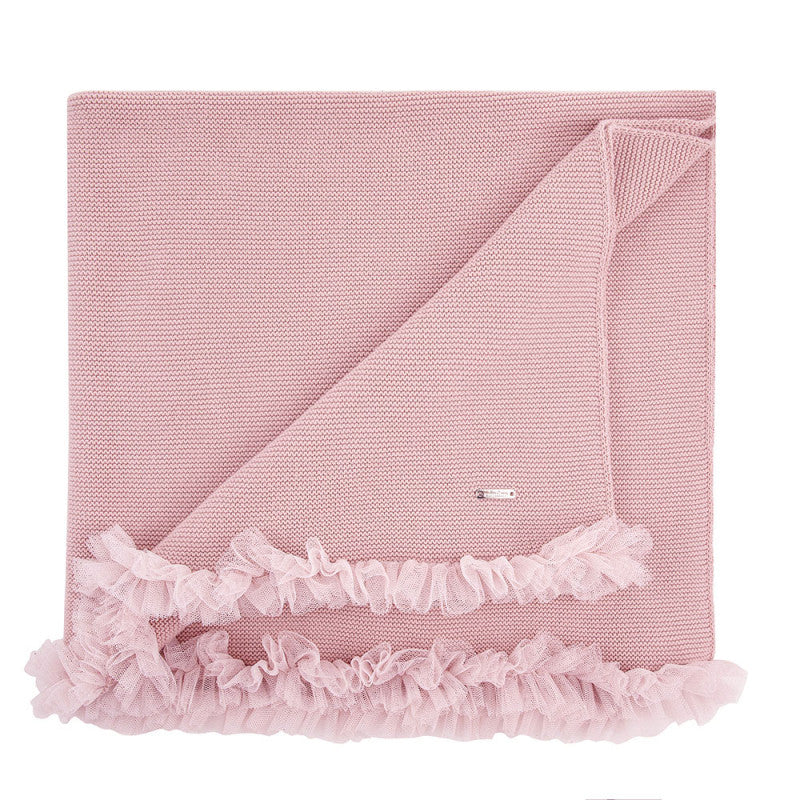 Copertina con bordo di tulle.